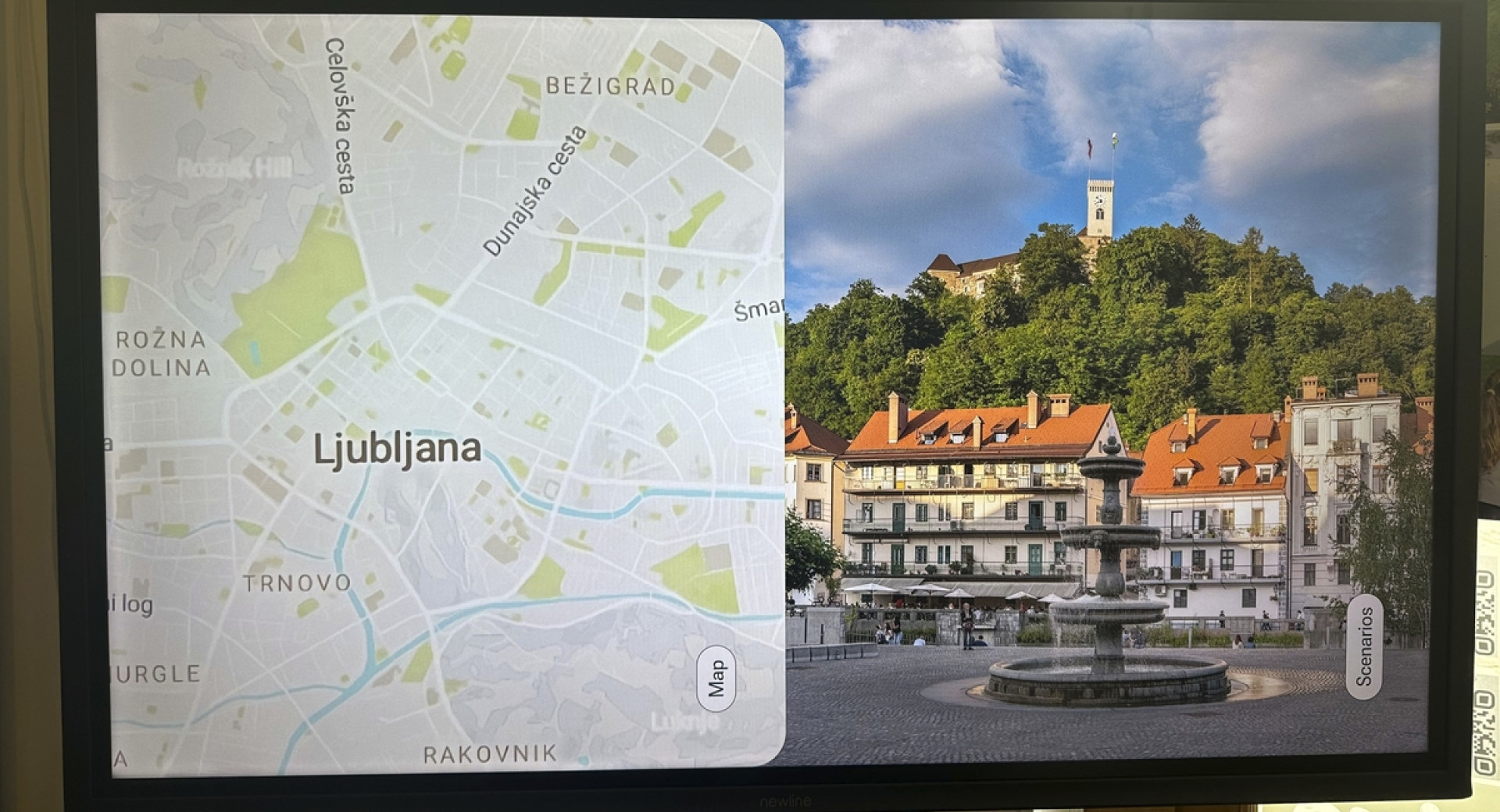 Zaslon z zemljevidom in fotografijo Ljubljane.