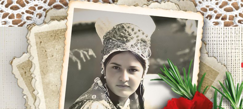 Black-and-white portrait of a girl in traditional costume.