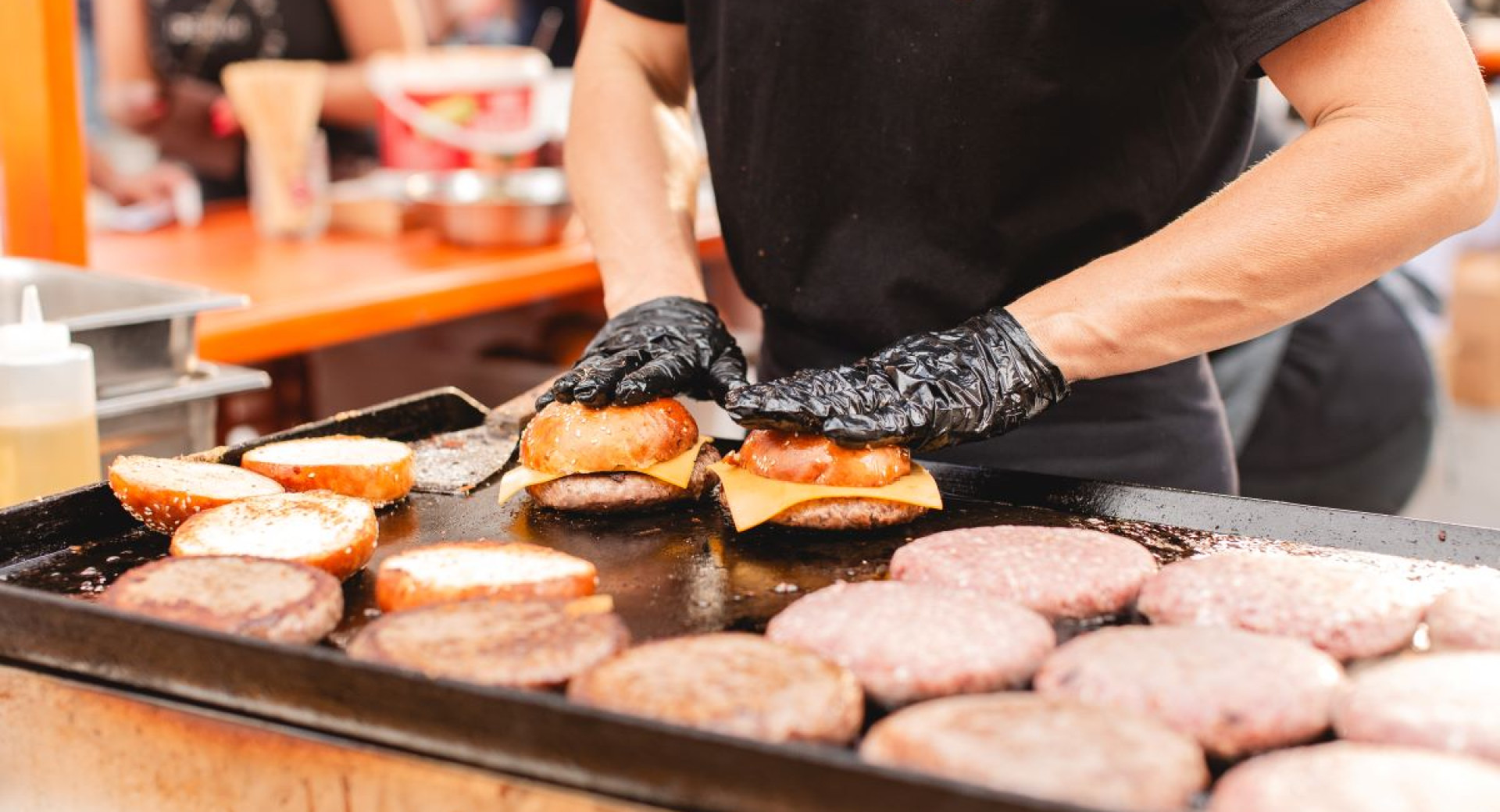 Hamburgers on a barbecue.