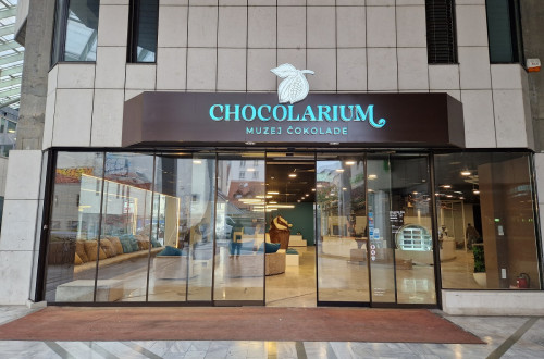 The large glass doors with the inscription "Chocolarium."