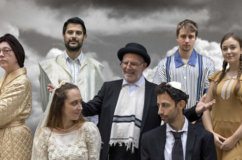 Jewish bride and groom with their wedding guests.